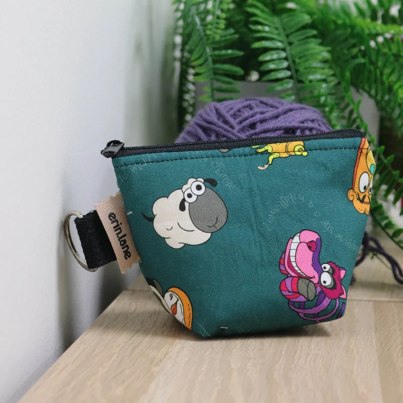  Fashionable Handbags At Must-Have PricesStylish Statements Take Me Too Notions Bag in Alice in Wonderland Sheeple