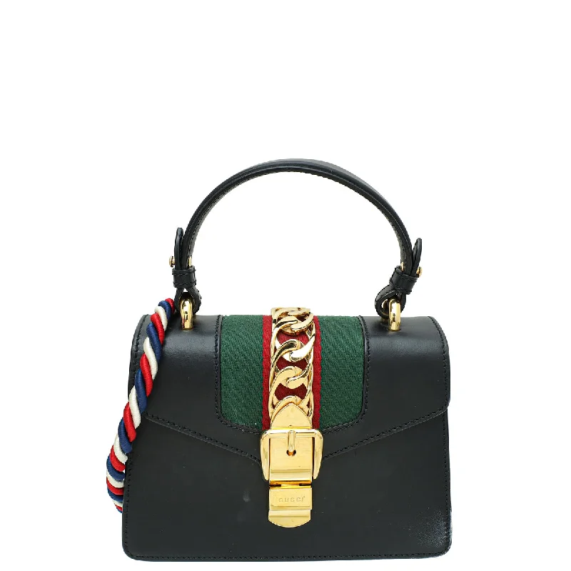  Designer Bags, Low PricesSustainable Fashion Extravaganza Gucci Black Sylvie Top Handle Flap Mini Bag