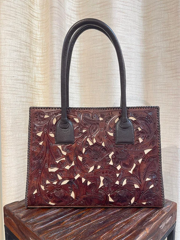  Stylish And Functional Bags Now At Reduced RatesJuan Antonio Tooled Leather Handbag with Ivory Inlay