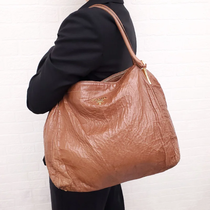  Luxury Meets Affordability – Shop Stunning Bags NowPRADA BROWN LEATHER BAG