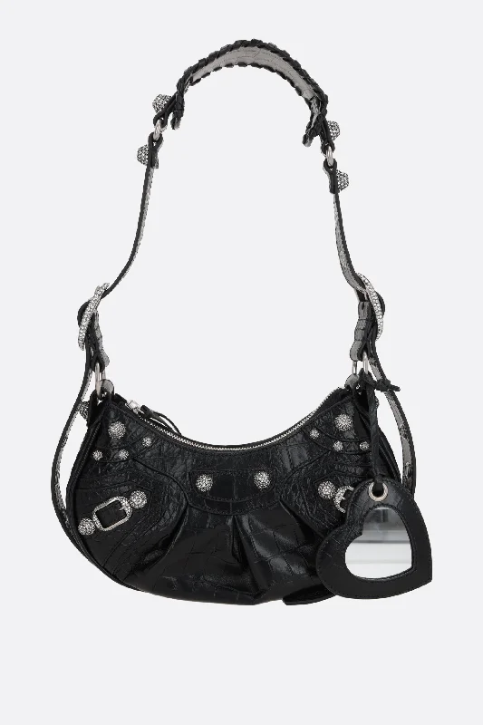  Everyday Handbags At Wallet-Friendly PricesLe Cagole XS crocodile embossed leather shoulder bag