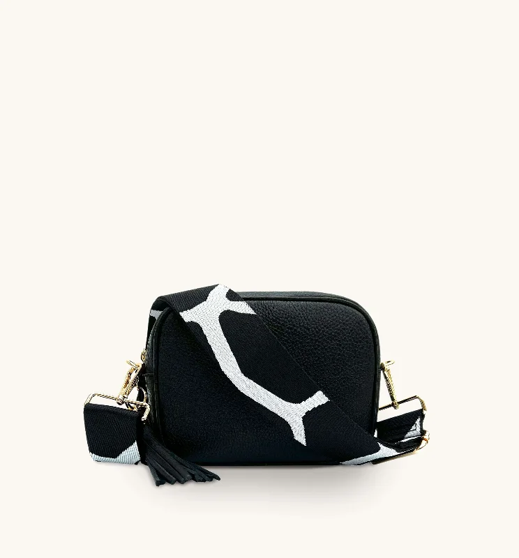 Limited-Time Sale On Trendy Handbags – Don't Miss OutThe Tassel Black Leather Crossbody Bag With Black & White Giraffe Strap Limited-Time Sale On Trendy Handbags – Don't Miss OutThe Tassel Black Leather Crossbody Bag With Black & White Giraffe Strap