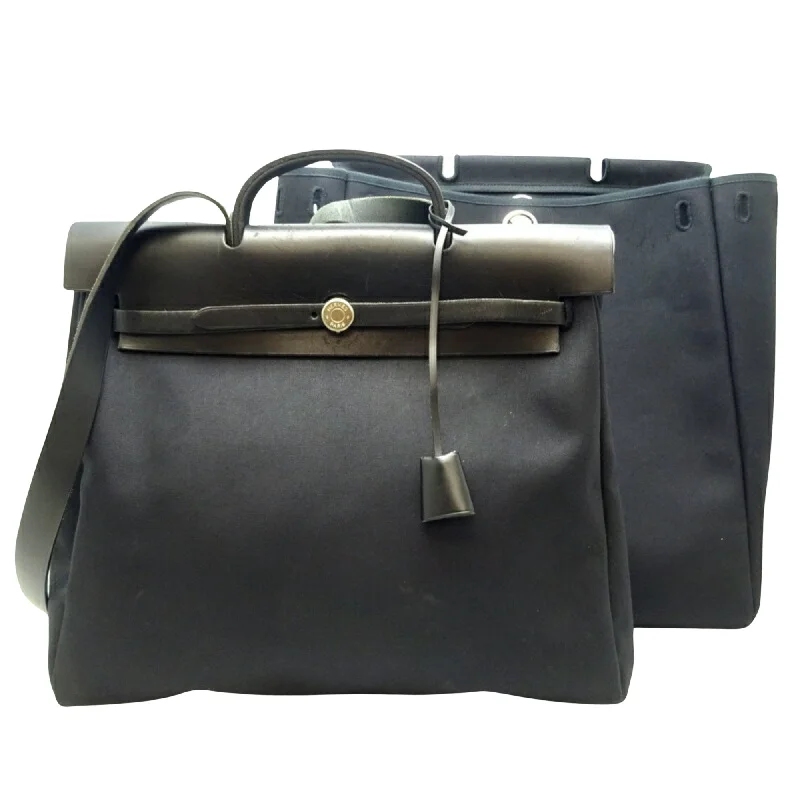 Fashionable Handbags At Must-Have PricesHermès Herbag Canvas Shoulder Bag (Pre-Owned) Fashionable Handbags At Must-Have PricesHermès Herbag Canvas Shoulder Bag (Pre-Owned)