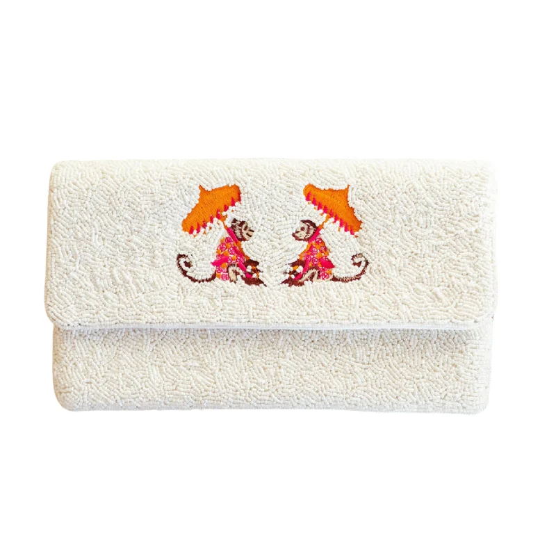  Premium Handbags At Unbeatable MarkdownsOn-Trend Fashion Offers White Beaded Monkey Beaded Clutch