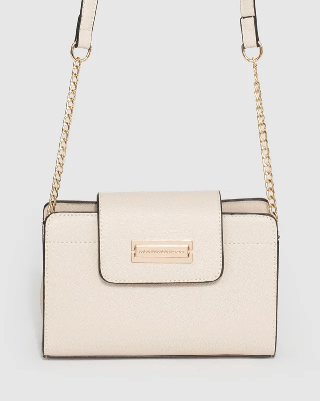  The Ultimate Handbag Sale – Elegant Styles At Lower PricesIvory Yelena Plate Crossbody Bag