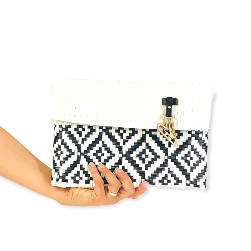  Iconic Fashion Bags At Unbeatable SavingsMaria Victoria | Opposite White & Black Multicolor Clutch | Upcycled, Handwoven