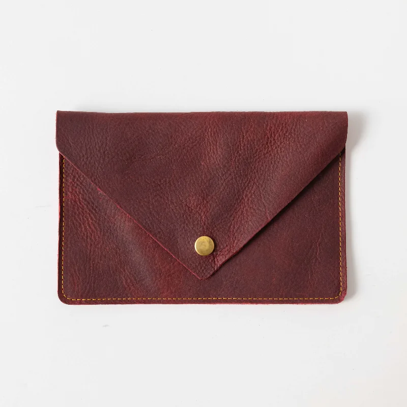  Everyday Handbags At Wallet-Friendly PricesRed Kodiak Leather Clutch