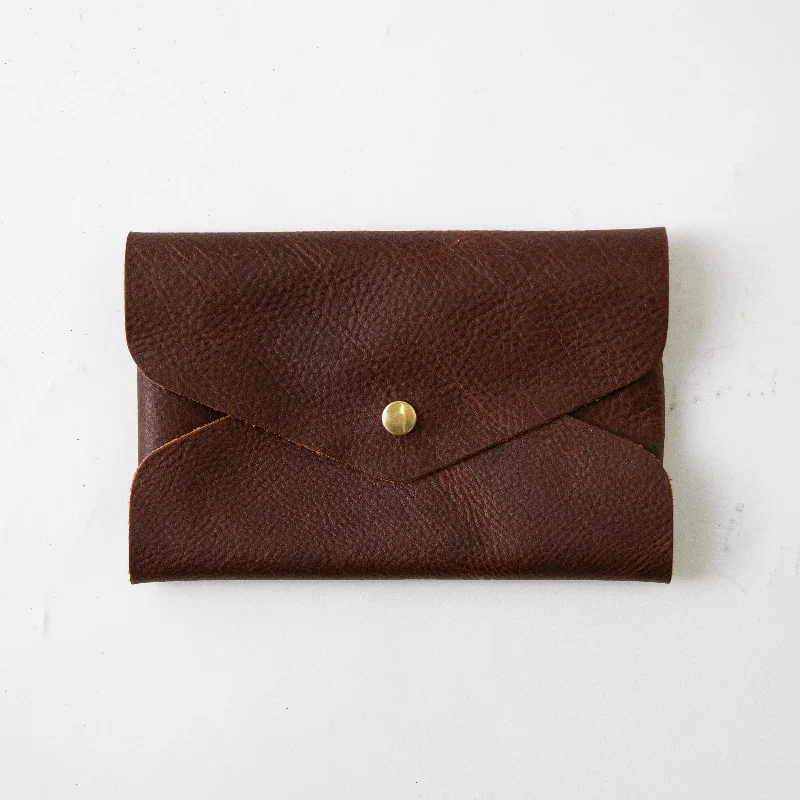  Stylish Handbags With Exclusive Online DiscountsTan Kodiak Envelope Clutch