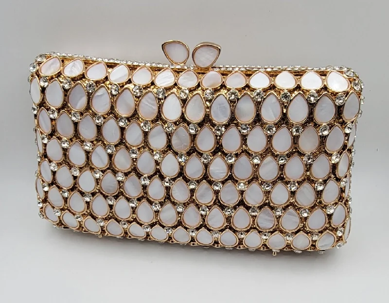  Trendy And Timeless Handbags Now On SaleIZZY Shell Clutch